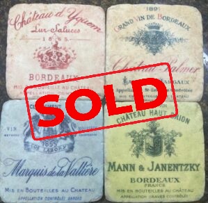 Four vintage French wine label coasters
