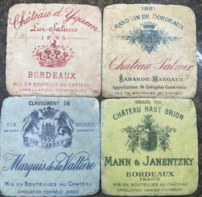 Four vintage French wine label coasters
